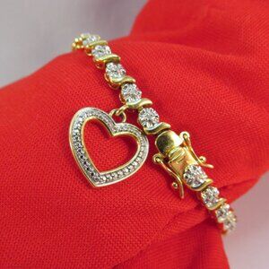 Gold Plated Tennis Bracelet with Heart Charm and Safety Clasp